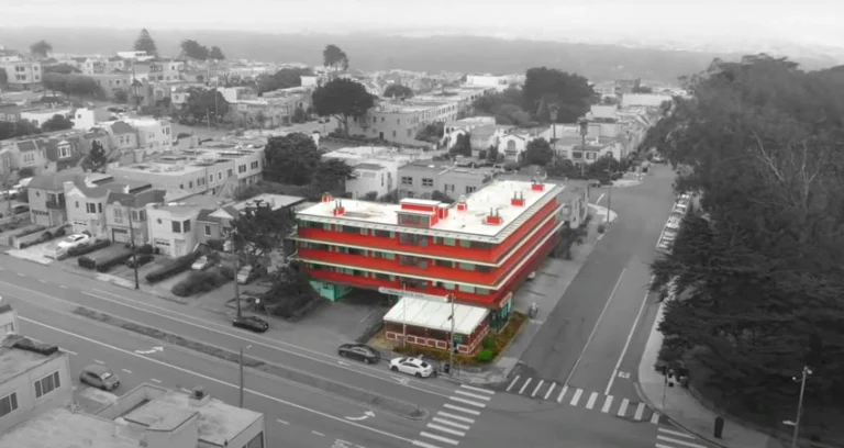 Seal Rock Inn - Where to Stay for San Francisco's Summer Festivals - Black and White image of Seal Rock Inn Hotel in colored.