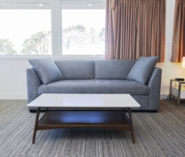 Seal Rock Inn - Room 204 - Sofa and table