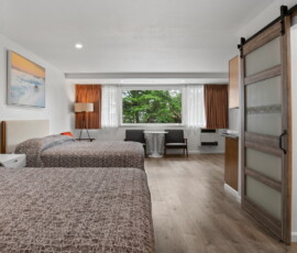 Seal Rock Inn - Room 109 - hotel room entrance view with closet