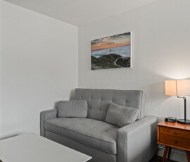 Seal Rock Inn - Room 303 - Couch Bath door